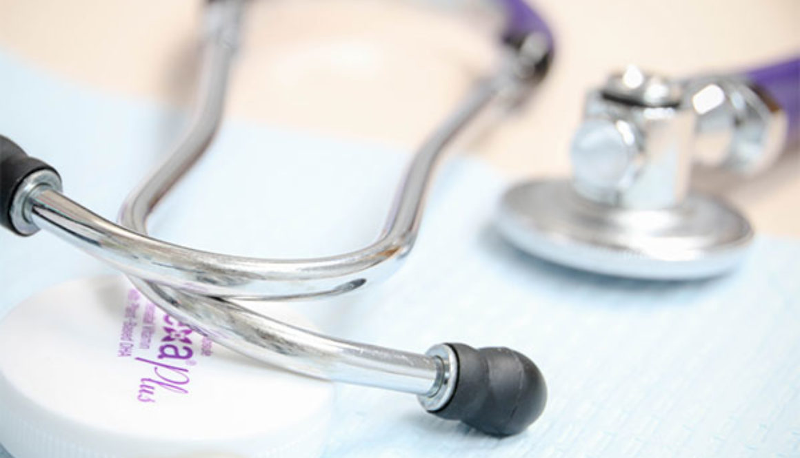 Image of stethoscope sitting at doctor's station.