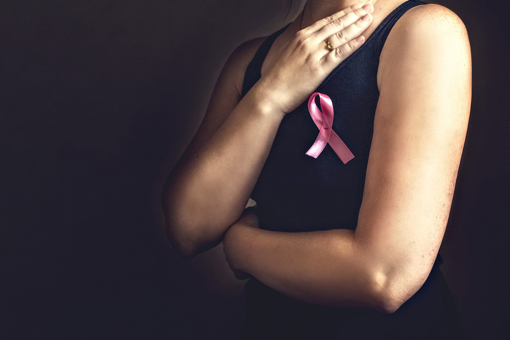 Woman Dressed in Black with Pink Breast Cancer Ribbon How Does Breast Cancer Affect Mental Health
